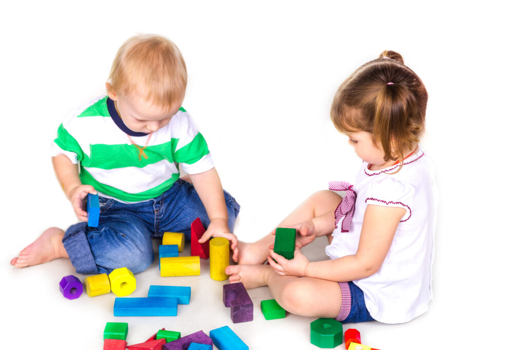 Children playing with blocks - play-based learning